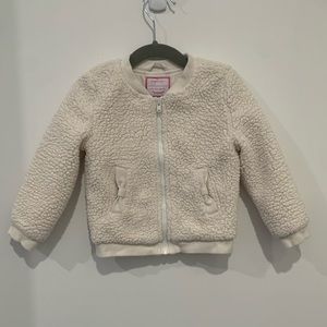 Gymboree girls Sherpa zip-up coat with bow detail on the pockets. Size 2.